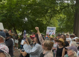 HANDS OFF UVA Rally
